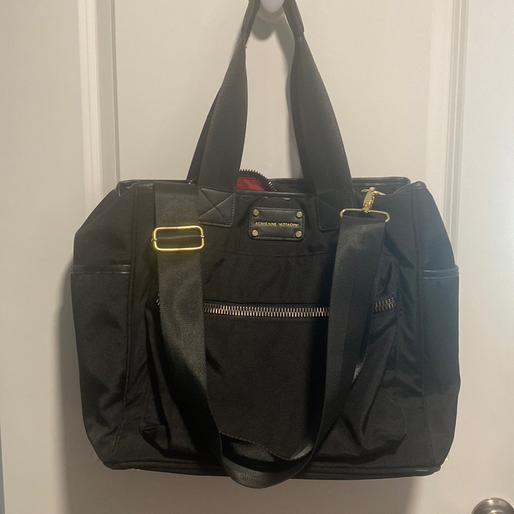 Black Adrienne Vittadini travel tote. Perfect for flights and on the go.